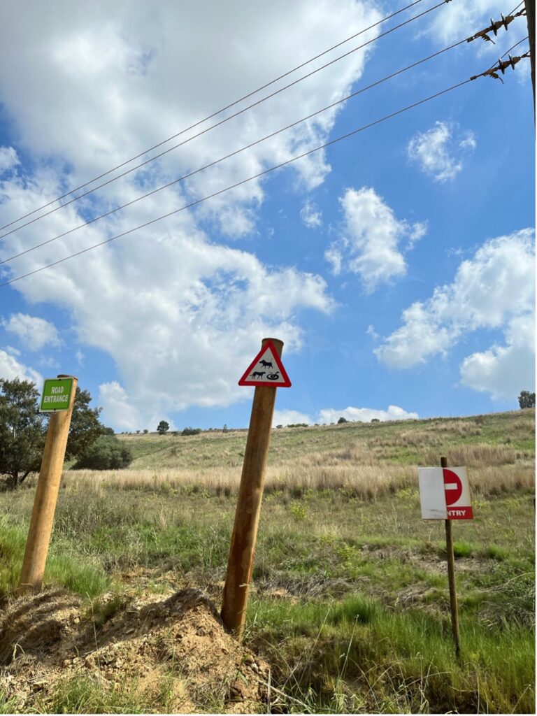 Signs along the Brakpan Tailings Storage Facility 