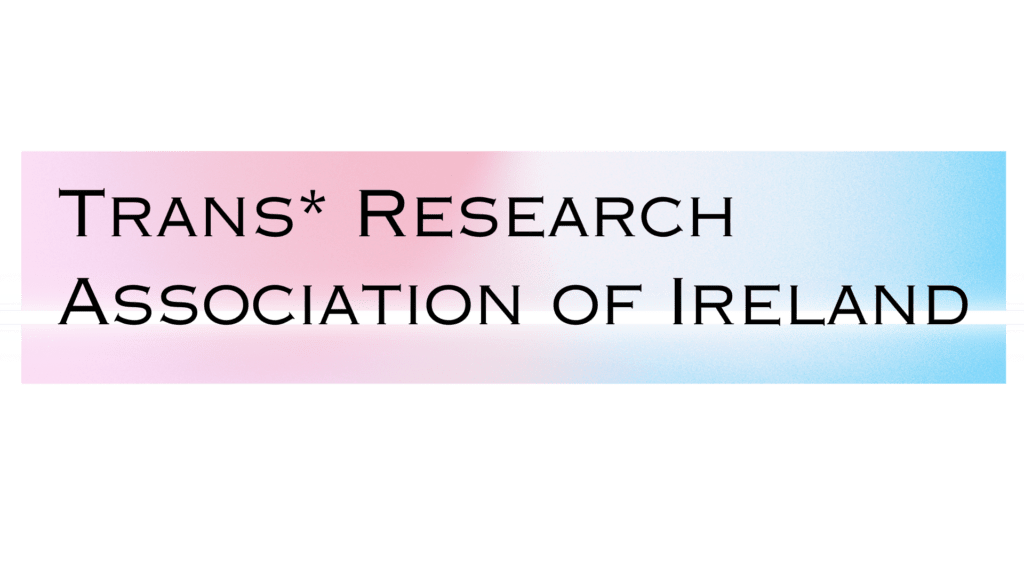 The Trans* Research Association of Ireland's logo, which says the association name in all capitals in black in a serif font over a pink and blue background, with some white through the centre.